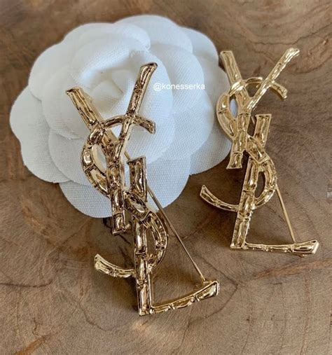 ysl broszka|BROOCHES AND RINGS .